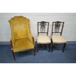 AN EDWARDIAN MAHOGANY AND BOX STRUNG INLAID WING BACK ARMCHAIR, on square tapered legs and brass