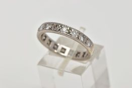 A WHITE METAL FULL DIAMOND ETERNITY RING, channel set with a variety of round brilliant cut,