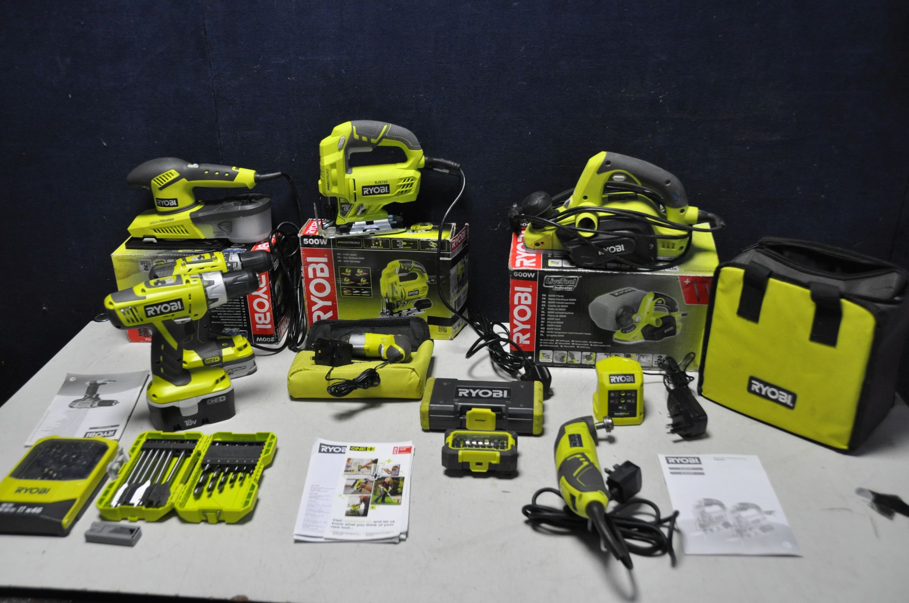 A COLLECTION OF RYOBI comprising of two RYOBI RCD1802 18v cordless drill drivers, RYOBI CSD41 4v