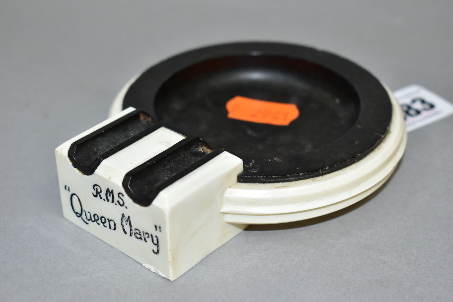 AN ART DECO BAKELITE RMS QUEEN MARY ASHTRAY, in cream and black, with RMS Queen Mary marked on one - Image 2 of 5