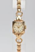 A 9CT GOLD CARA LADY'S WRISTWATCH, the circular white face with Arabic numerals and baton hour