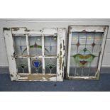 TWO LEAD GLAZED ART NOUVEAU WINDOWS, one window with six separate panels, distressed frames, 81cm