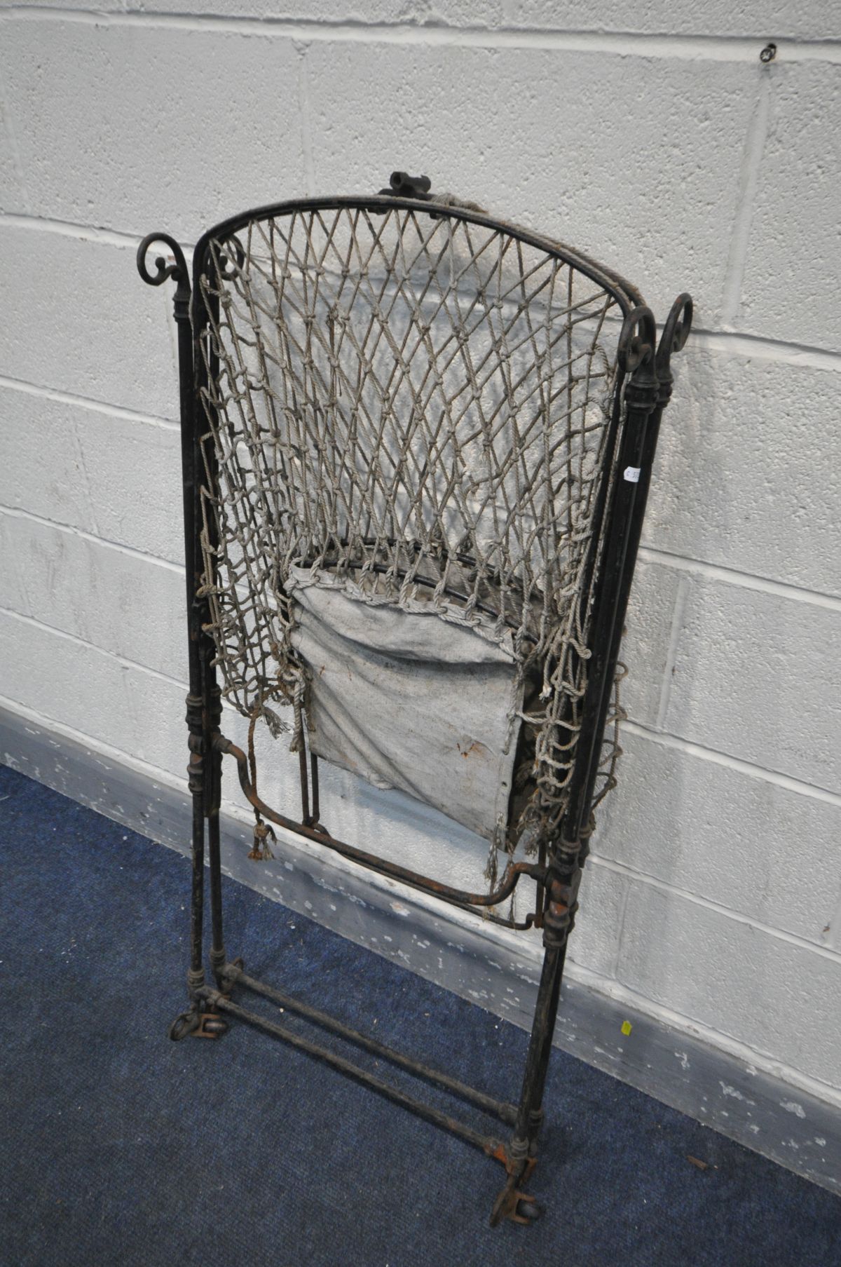 A VICTORIAN WROUGHT IRON FOLDING CHILDS COT - Image 3 of 3