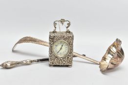 A SILVER CASED CARRIAGE CLOCK, BUTTON HOOK AND A LADLE, the carriage clock detailed with an embossed