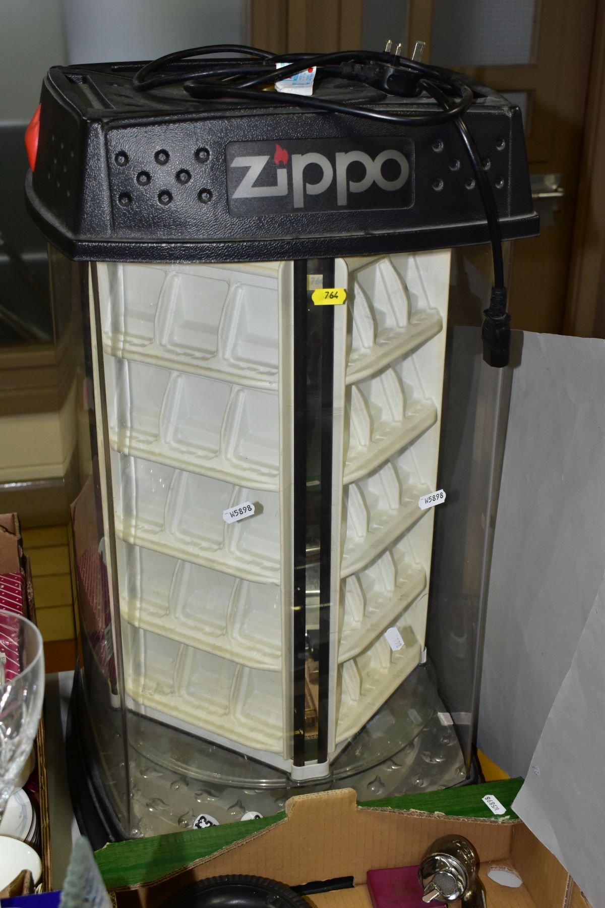 A PLASTIC 'ZIPPO' LIGHTER SHOP DISPLAY CABINET WITH REVOLVING CENTRE, (not tested), height 69cm - Image 2 of 7