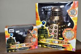 TWO BOXED RADIO CONTROLLED DALEKS, comprising a Character Options Ltd copper coloured radio