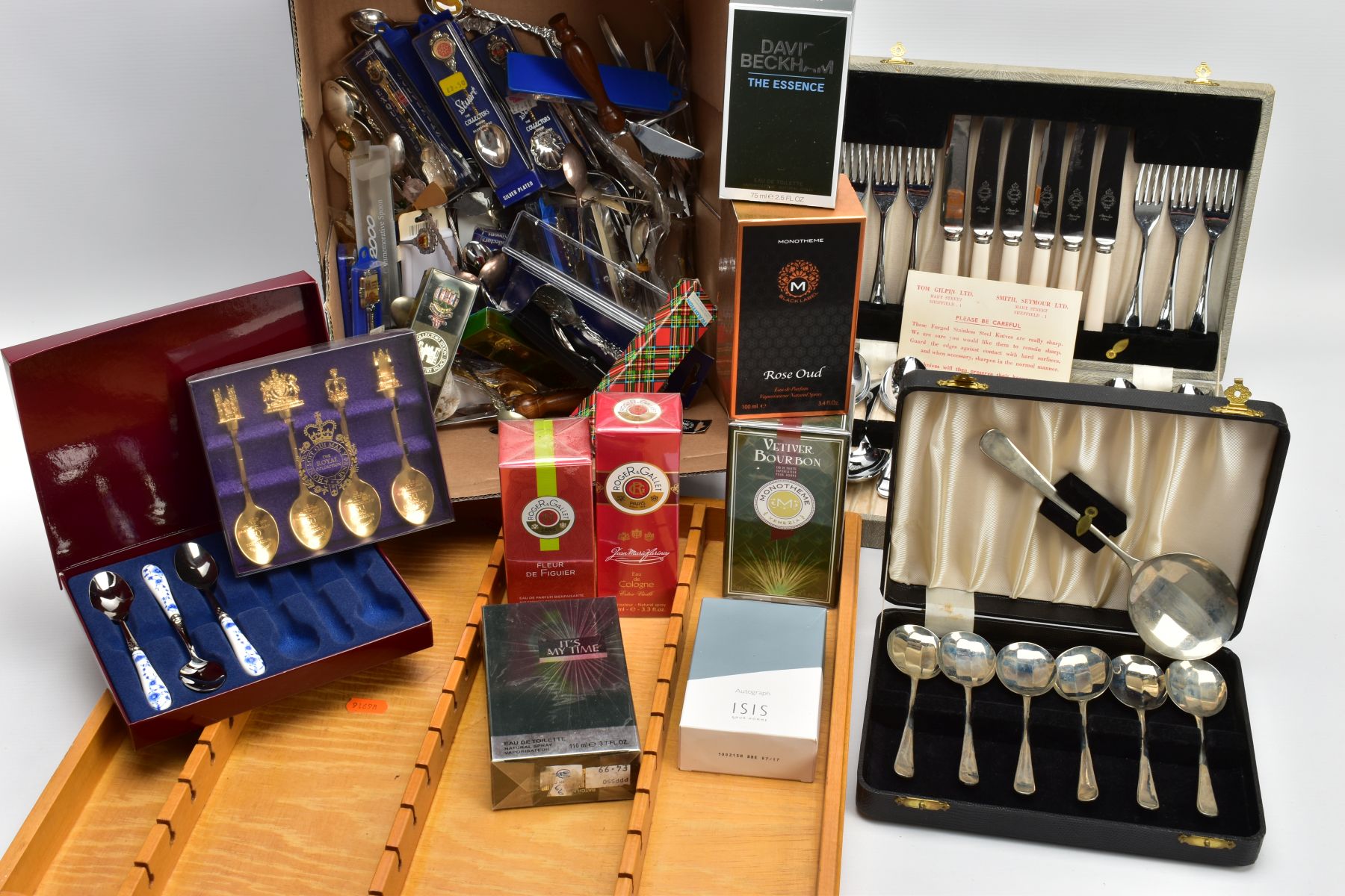 A BOX OF ASSORTED CUTLERY, to include a cased set of seven nickle silver shell shaped dessert