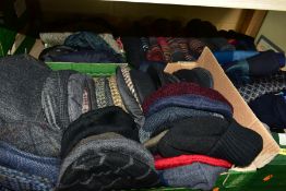FOUR BOXES OF GENTS FLAT CAPS, SCARVES, GLOVES, ASSORTED HATS AND SOCKS, the socks in packs, sized