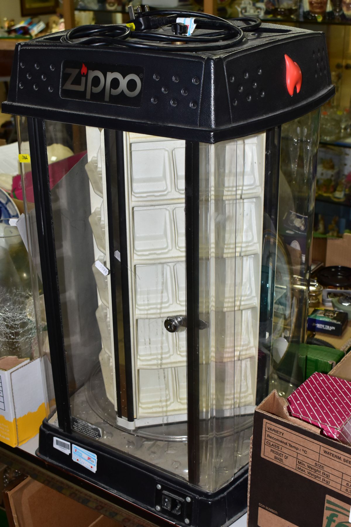 A PLASTIC 'ZIPPO' LIGHTER SHOP DISPLAY CABINET WITH REVOLVING CENTRE, (not tested), height 69cm - Image 6 of 7