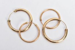 TWO PAIRS OF YELLOW METAL HOOPS, two pairs of hollow hoops, one pair measuring approximately 25mm,