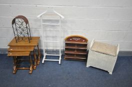 AN OAK NEST OF THREE TABLES, a painted valet stand, a Lloyd loom linen basket, a mahogany