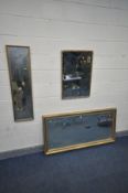 A RECTANGULAR GILTWOOD BEVELLED EDGE WALL MIRROR, 152cm x 76cm together with two other giltwood wall