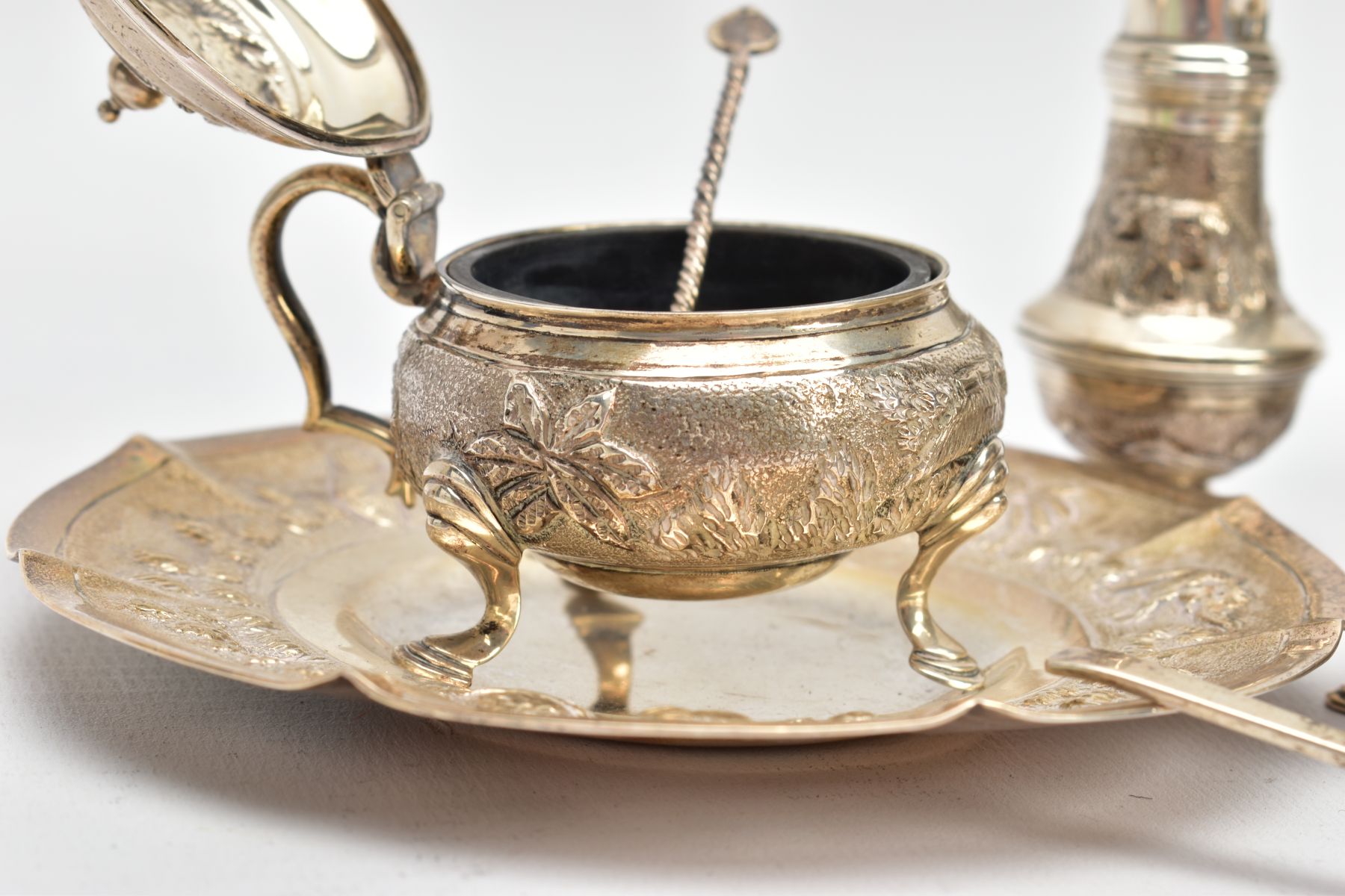A SELECTION OF INDIAN WHITE METAL ITEMS, to include a white metal tea strainer with a circular - Image 4 of 10