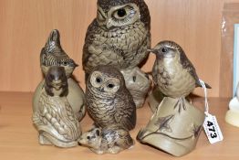 SEVEN POOLE POTTERY STONEWARE BIRD AND ANIMAL FIGURES, comprising two owls, heights 17cm and 8.