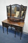 AN EDWARDIAN MAHOGANY DRESSING TABLE, with a triple mirror and seven assorted drawers, width 123cm x