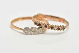 A 9CT GOLD GEM SET RING AND A YELLOW METAL DIAMOND RING, the first ring of a half eternity design,