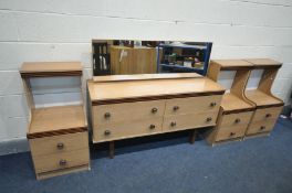 A MID-CENTURY TEAK EFFECT DRESSING TABLE, with four drawers and rectangular mirror, width 131cm x