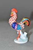 A MINIATURE HEREND PORCELAIN COCKEREL IN IRON RED FISHNET, model number 5042, printed and incised