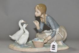 A LLADRO FIGURE GROUP FOOD FOR DUCKS, NO.4849, sculpted by Antonio Ruiz, issued 1973- 1995, height