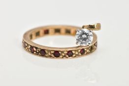 A 9CT GOLD FULL ETERNITY RING AND A PENDANT, the ring set with circular cut garnets (two are