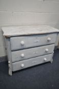 A PAINTED 19TH CENTURY CONTINENTAL STYLE CHEST OF THREE LONG DRAWERS, width 104cm x depth 50cm x