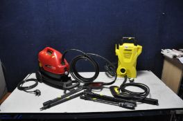 A KARCHER K2 COMPACT JET WASHER with one lance and extension and a Champion CPW1750 Jet washer