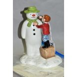 A ROYAL DOULTON LIMITED EDITION 'THE SNOWMAN AND JAMES 'DRESSING THE SNOWMAN', no.677 of 2500,