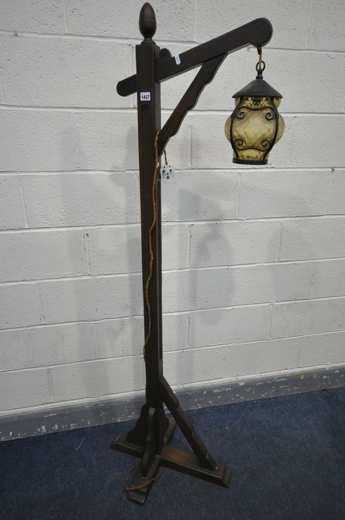 A HANGING LANTERN ON AN OAK FRAMED STAND, height 180cm