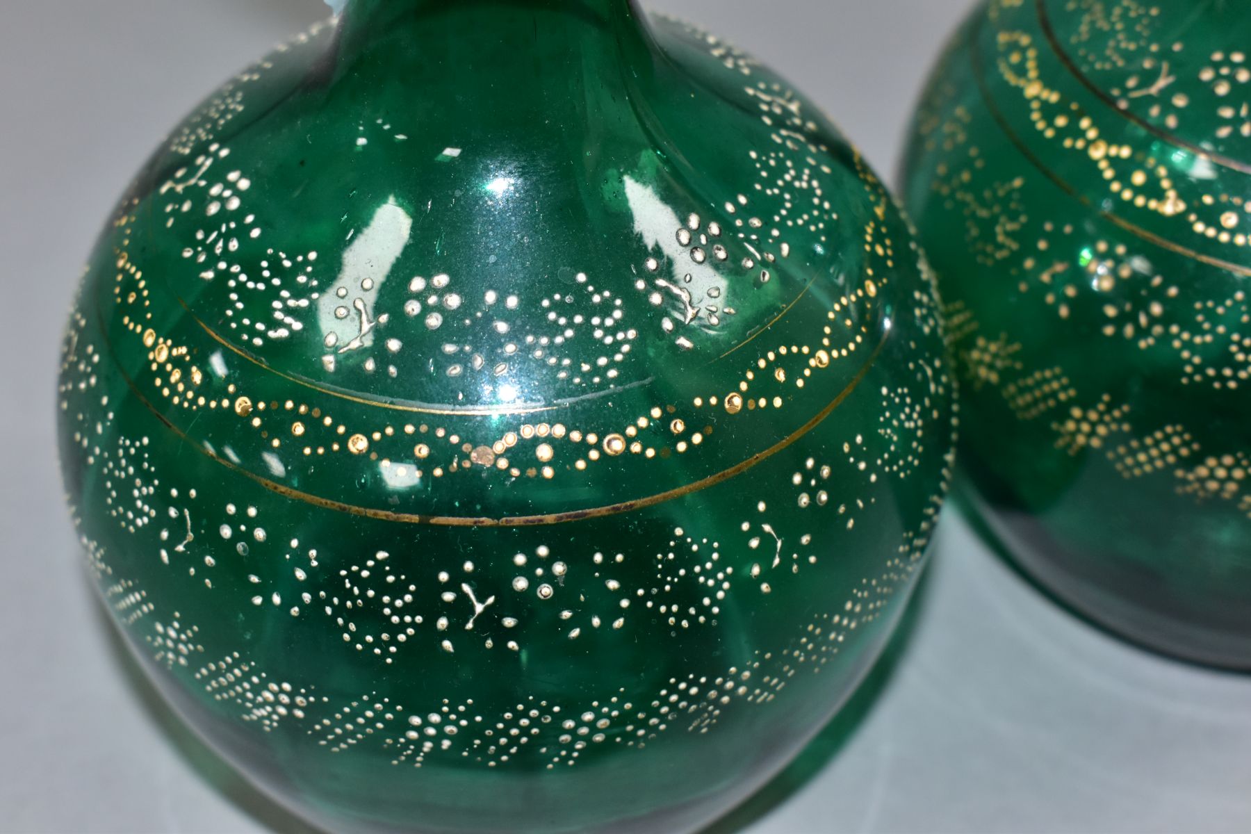 A PAIR OF VICTORIAN GREEN GLASS DECANTERS, with stoppers and four bands of dotted floral and other - Image 5 of 10