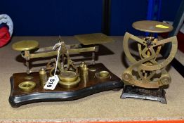 TWO SETS OF ANTIQUE POSTAL SCALES, with eight weights, comprising a brass South African set engraved