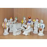 A GROUP OF EIGHT ROYAL DOULTON 'THE SNOWMAN GIFT COLLECTION' FIGURES AND MATCHING PIANO,