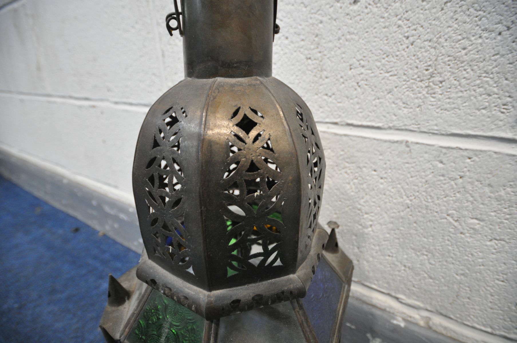 A 20TH CENTURY PRESSED METAL MOROCCAN HANGING LANTERN, with coloured glass panels, 20cm squared x - Image 2 of 4