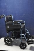 A DAYS ESCAPE LITE WHEELCHAIR ultra-lightweight folding wheelchair with seat cushion along with