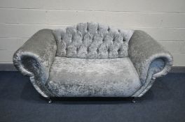 A SILVER VELVET STYLE BUTTONBACK SOFA, on chromed legs, length 183cm x inner length 110cm (this sofa