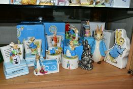 A GROUP OF ENESCO LTD PETER RABBIT ITEMS, comprising three boxed musical items (two Peter Rabbit