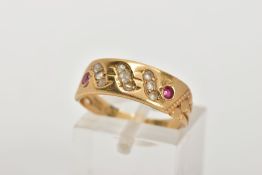 AN EARLY 20TH CENTURY RUBY AND DIAMOND RING, wide band set with two rows of three rose cut diamonds,