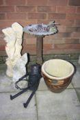 A METAL CIRCULAR BIRD BATH, diameter 35cm x height 57cm, a composite statue of a semi clad women,