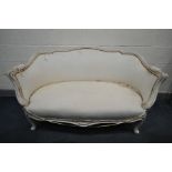 A LOUIS XV STYLE PAINTED SOFA, with an arched back and scrolled legs, length 138cm (condition:-ideal