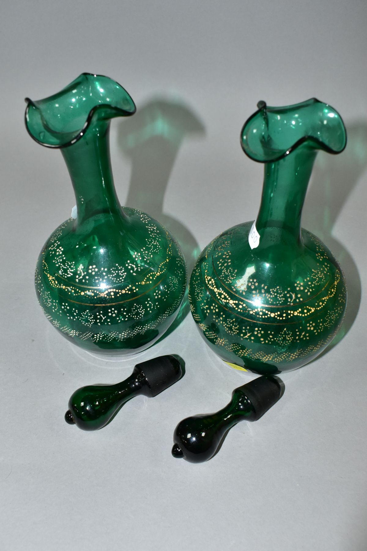 A PAIR OF VICTORIAN GREEN GLASS DECANTERS, with stoppers and four bands of dotted floral and other - Image 6 of 10