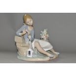 A LLADRO FIGURINE ROSALINDA, NO 4836, modelled as a young woman plucking off a rose petal,