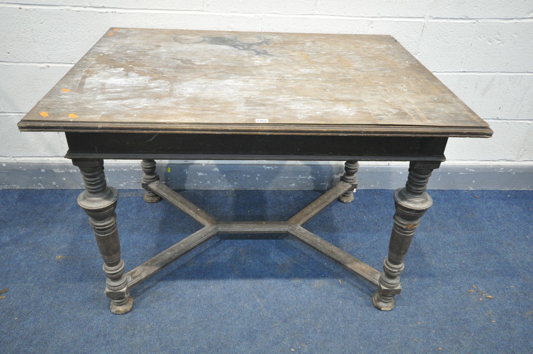 A FRENCH OAK DINING TABLE, on turned legs united by a cross stretcher, 116cm x 86cm x height 78cm (