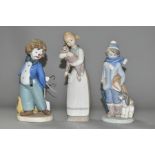 TWO LLADRO DAISA FIGURES AND A NAO FIGURE, comprising Winter, No.5220, sculpted by Juan Huerta,