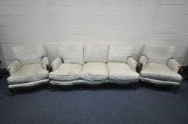 A FRENCH STYLE THREE PIECE LOUNGE SUITE, comprising a three seater sofa, length 193cm, and a pair of