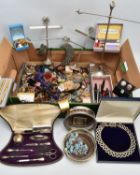 A BOX OF ASSORTED ITEMS, to include a silver handled manicure set encased in its original box,