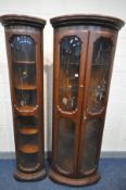 A REPRODUCTION ITALIAN MAHOGANY BOWFRONT FLOORSTANDING CORNER CUPBOARD, with five glass shelves,