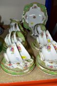 A FORTY PIECE PARAGON HONITON PART TEA SET, comprising a cake plate, cream jug, sugar bowl, preserve