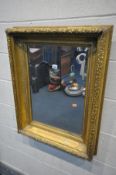 A GILTWOOD FRAMED BEVELLED EDGE WALL MIRROR, 62cm x 81cm (condition:-some gilt missing, see images)