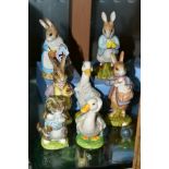 SEVEN BESWICK BEATRIX POTTER FIGURES, all BP10b, comprising boxed Mrs Rabbit Cooking, boxed Peter