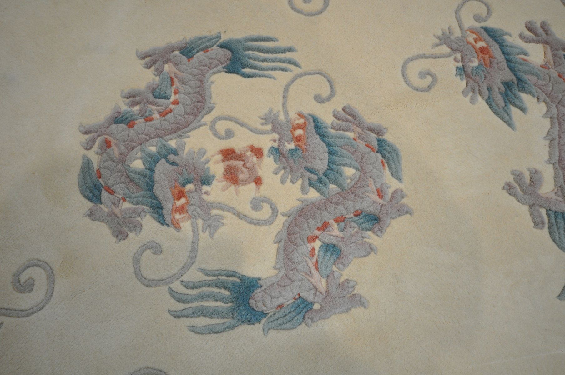 A CIRCULAR CREAM CHINESE RUG, with a dragon pattern, diameter 155cm - Image 3 of 4