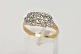 A YELLOW METAL DIAMOND RING, designed with a row of old cut diamonds (one round brilliant cut